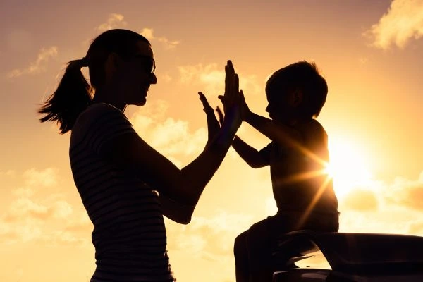 Image of happy mother and child after resolving child arrangements Surrey